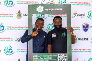 Founder of Agricgate Edutech LTD, Felix Appiah (right) and a participant at the launch 